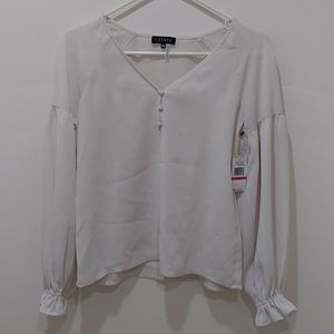 1. STATE Long Sleeved Retro Bloom Top